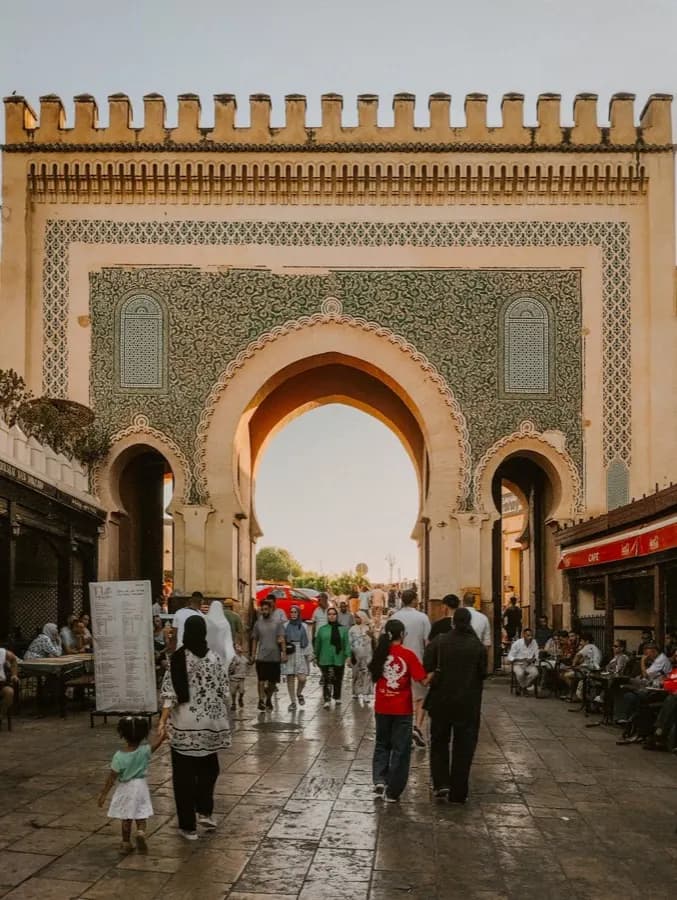 eSIM Fes Morocco - rooftop view over the labyrinthine medieval medina of Fes with minaret above