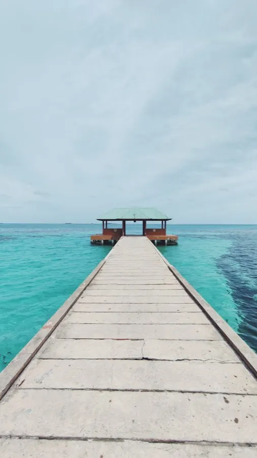 eSIM Hulhumale Maldives - modern reclaimed island city with turquoise lagoon and Maldives skyline