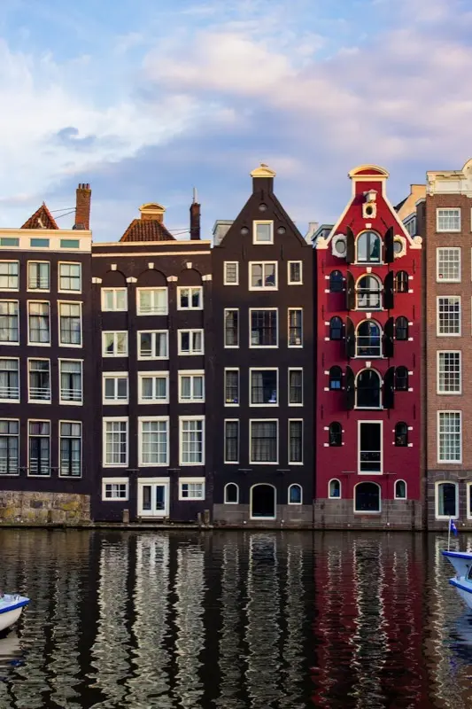 Damrak Canal Gabled Houses in Amsterdam Netherlands with HelloRoam eSIM connectivity