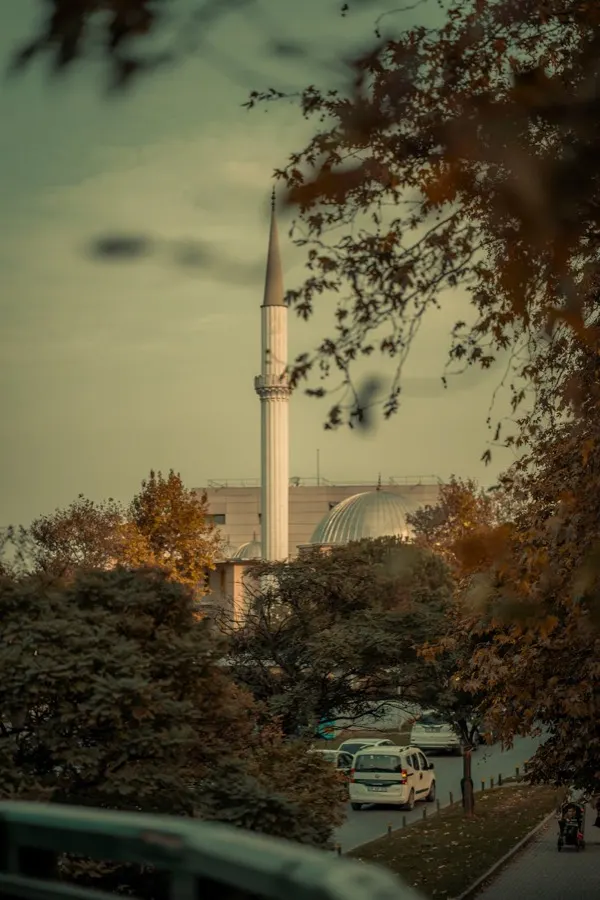 eSIM Bursa Turkey - Ottoman Grand Mosque minaret towering over the historic city center with Uludag mountain behind