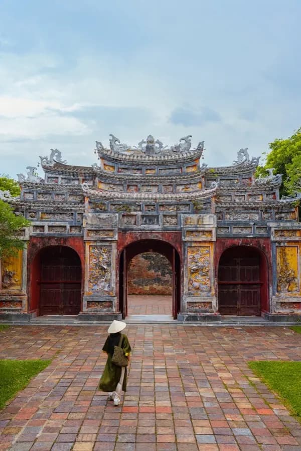 eSIM Hue Vietnam - Imperial Citadel flag tower reflected in the moat of Vietnam's former royal capital
