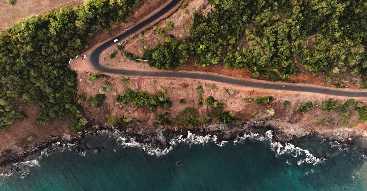 Scenic coastal road in India representing affordable international travel budgets under Rs 50,000 for Indians