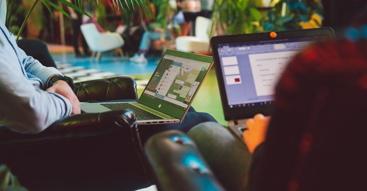 Remote workers on laptops amid indoor plants in one of Singapore's best coworking spaces