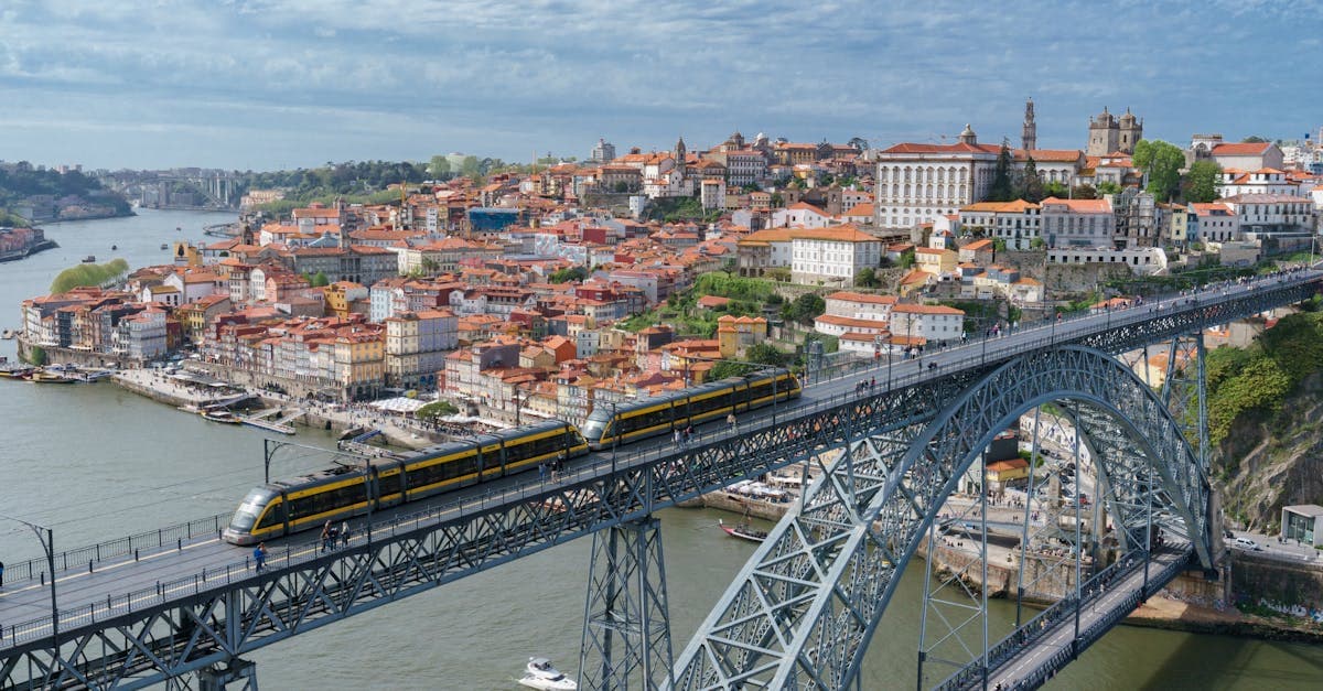 Iconic Luís I Bridge spanning Porto's Douro River showcasing Portugal's appeal for digital travel eSIM visa travelers.