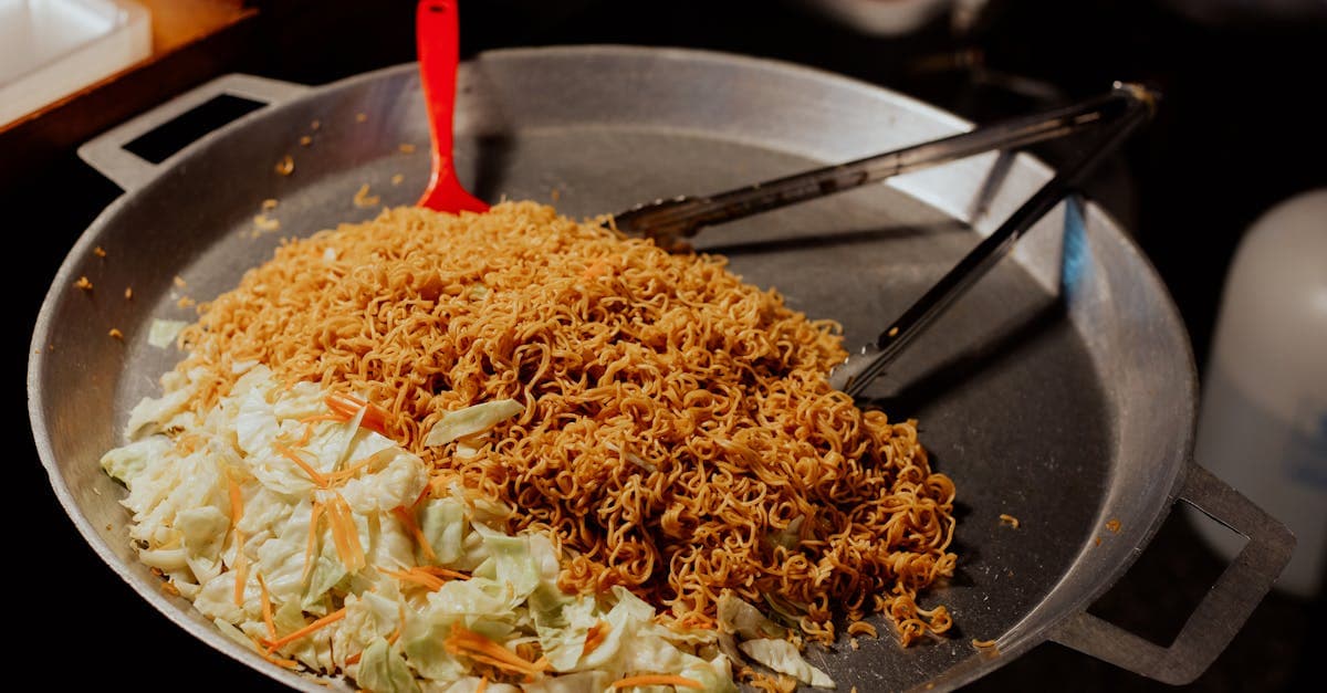 Wok-fired noodles with vegetables, a Chinese hawker classic at the top of what to eat in Singapore lists