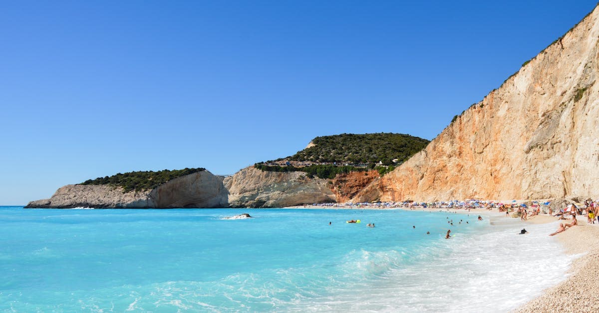 Dramatic cliffs and crystal-clear turquoise waters at Egremni Beach in Greece, a best-value EU beach break
