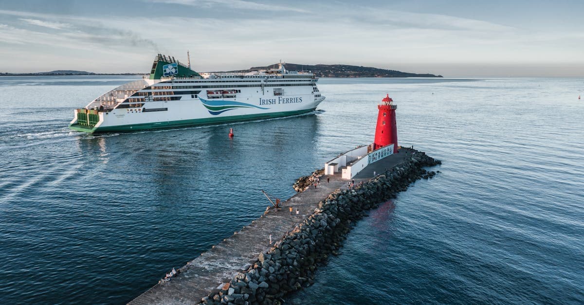 Irish Ferries vessel passing Poolbeg Lighthouse in Dublin Bay, where maritime satellite roaming fees apply