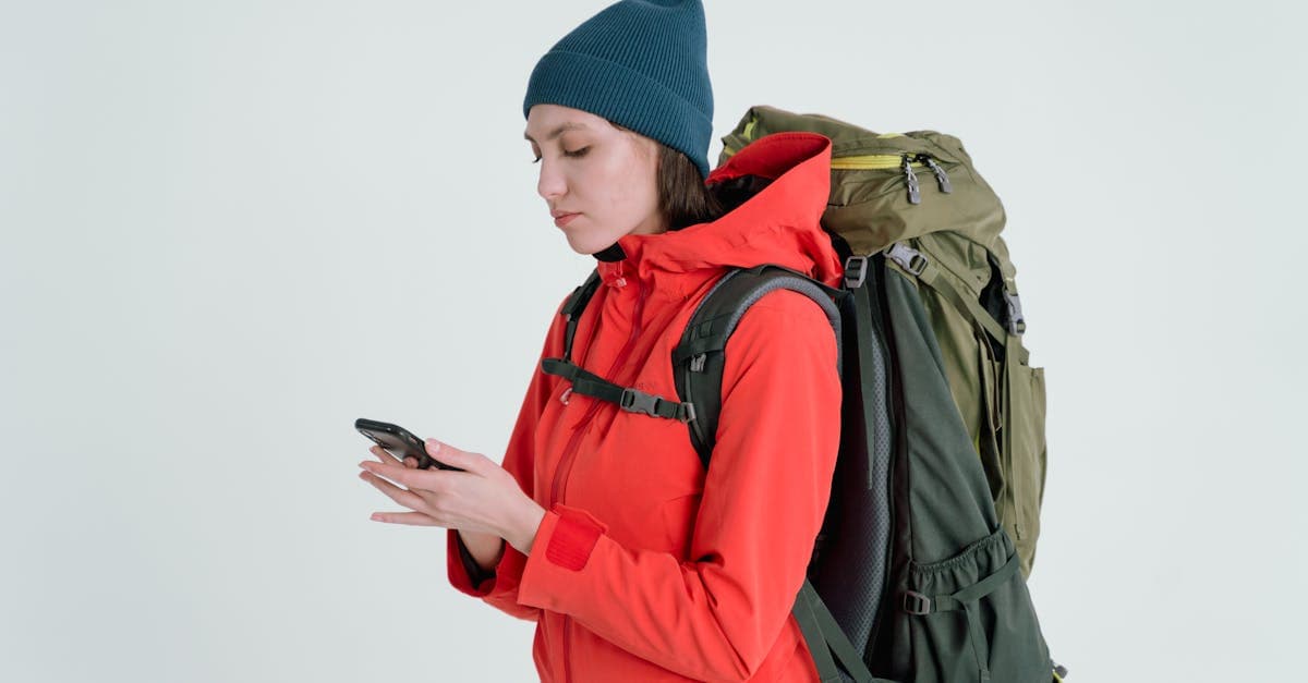 Essential navigation apps make solo travel Japan more accessible, as a traveller consults routes on her smartphone