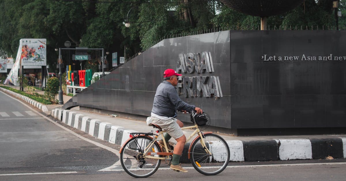 A cyclist rides past the iconic Asia Afrika Street in Bandung, Indonesia.