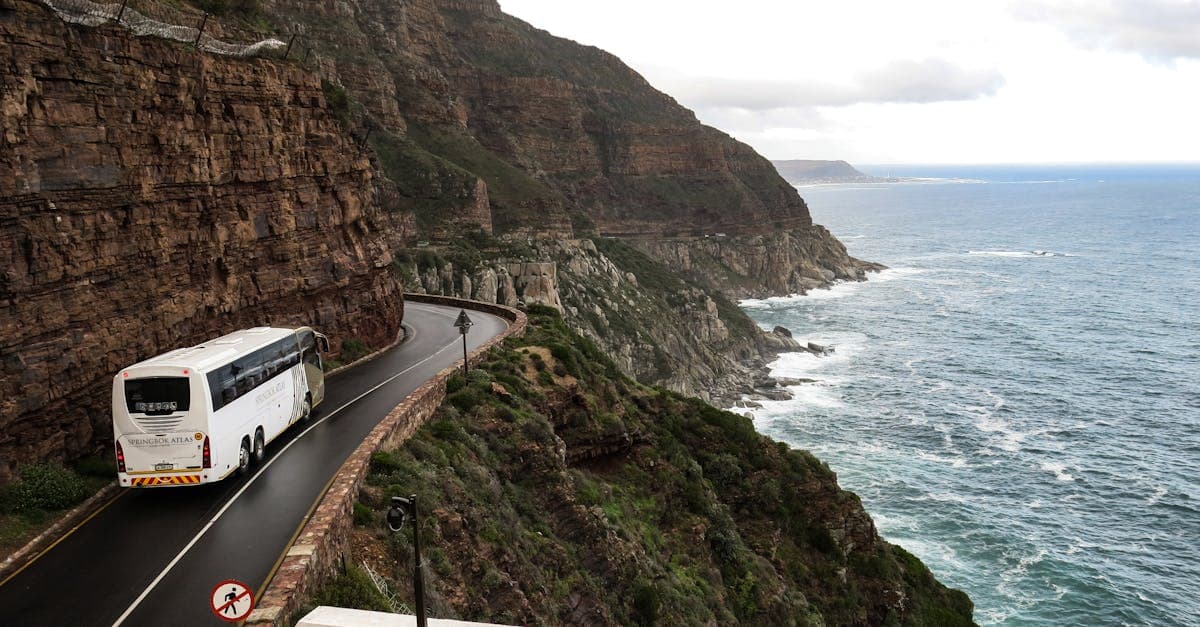 Scenic coastal road trip in South Africa showing why travel insurance is essential for adventurers