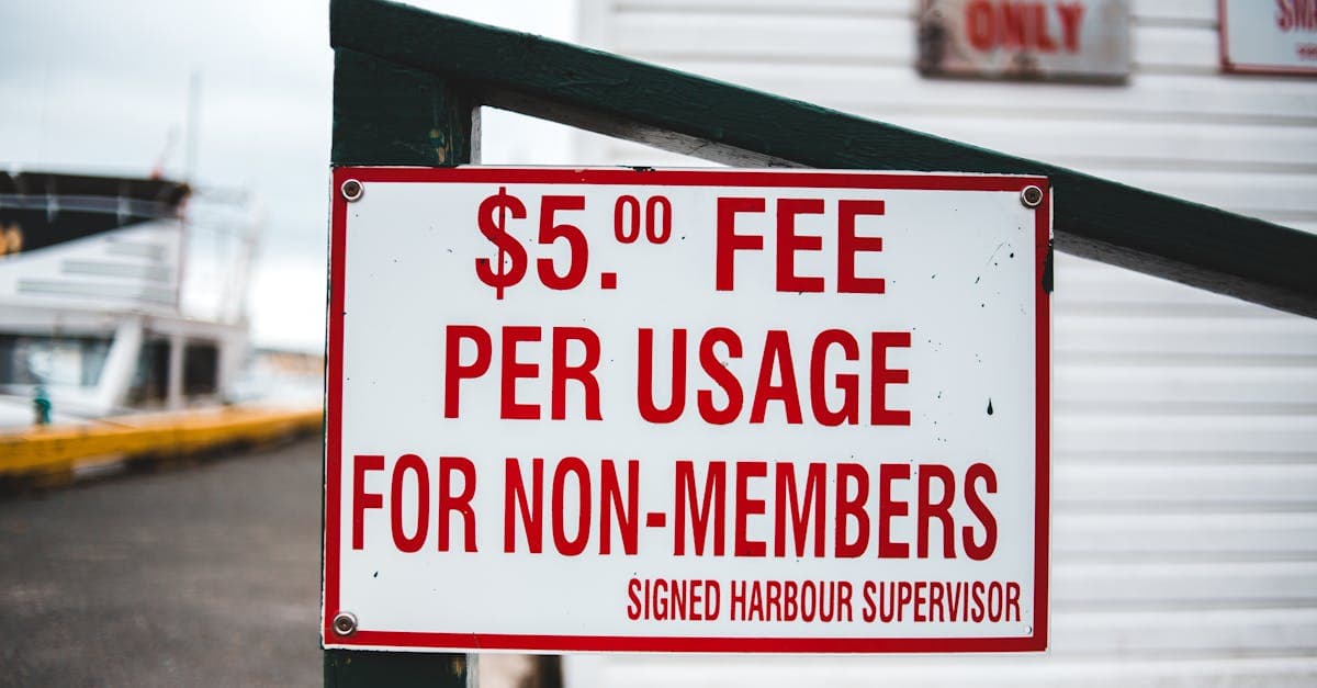 Close-up of a $5 fee sign at a harbour, highlighting unexpected roaming charges in South Africa