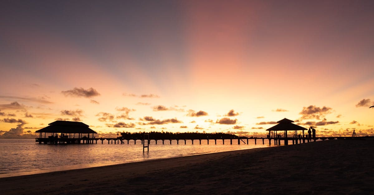 Tropical beach at sunset in Rarotonga, where NZ phone roaming options vary by carrier and plan