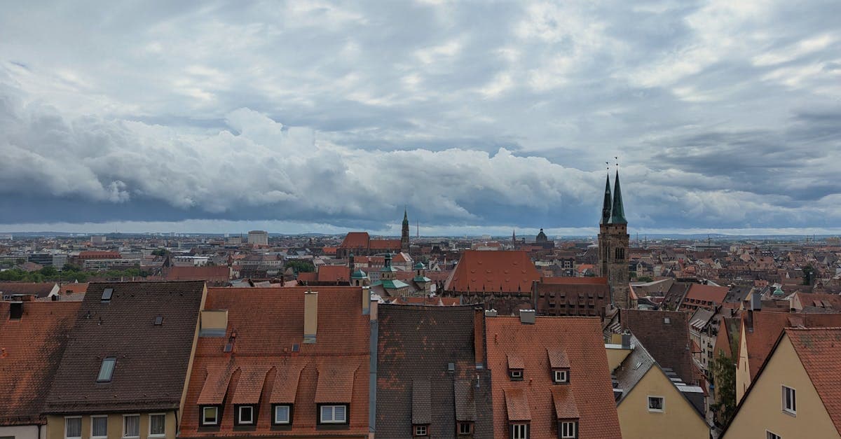 Explore Nuremberg's historic architecture beneath a moody, clouded sky.