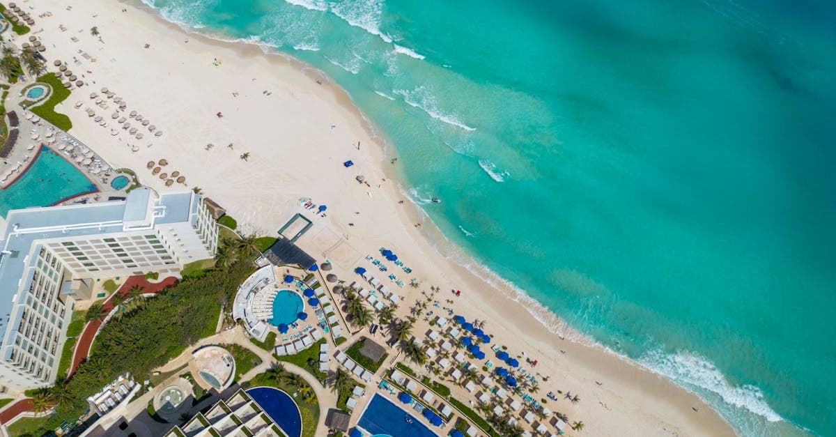 Is Cancun safe right now? Sun-drenched resort beach and turquoise water along the Hotel Zone in 2026