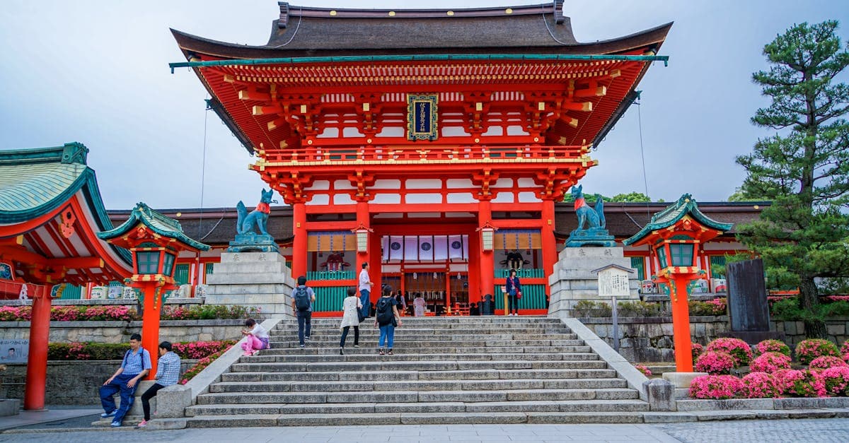 Vivid red torii gates at Fushimi Inari Shrine in Kyoto, perfect landmark to activate your eSIM Japan