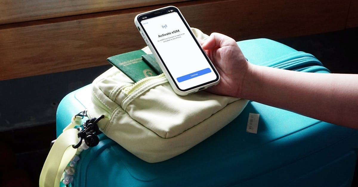 Traveler activating an eSIM on a smartphone over luggage as a portable wifi hotspot alternative abroad