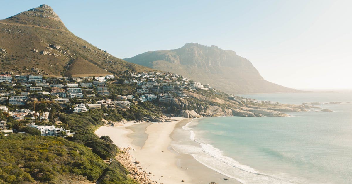 Aerial view of Cape Town's stunning coastline helping answer which is the best travel insurance south africa